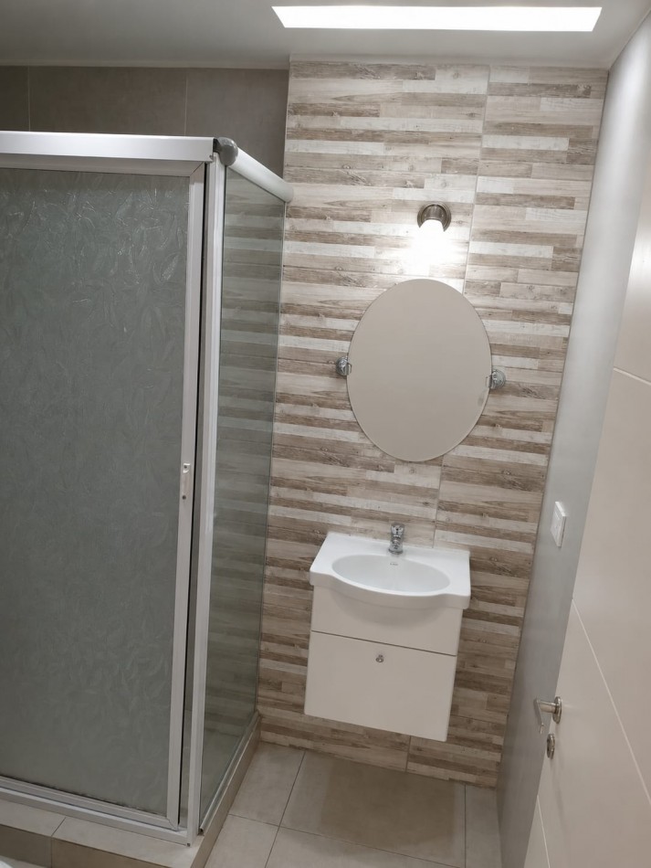DEPARTAMENTO DE 3 AMBIENTES CON COCHERA
